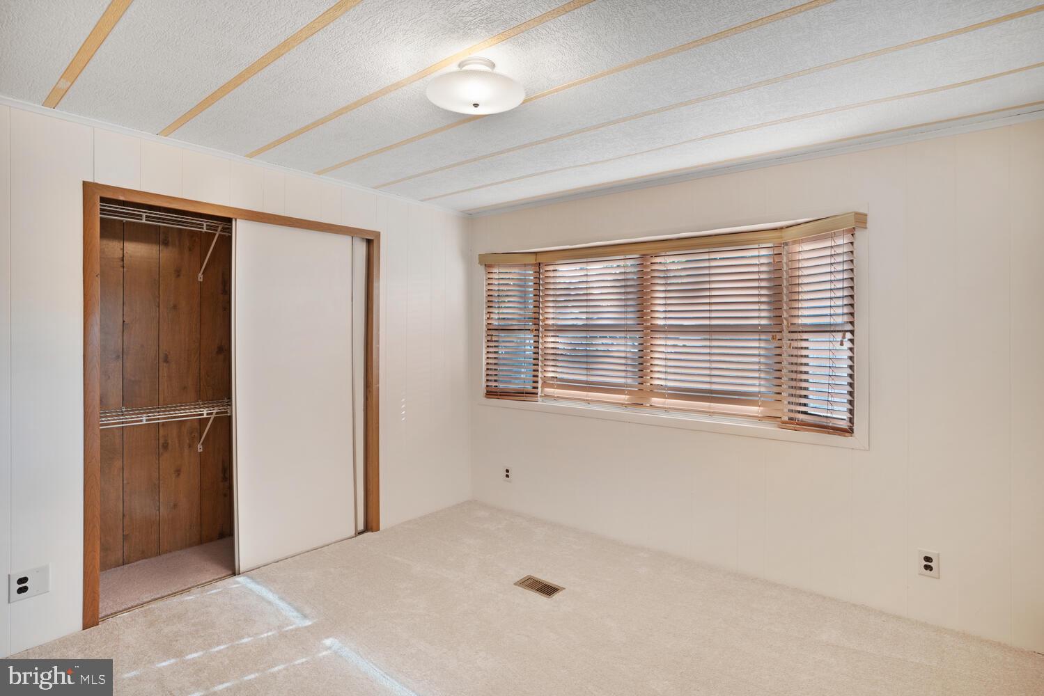 34 Holly Road West Creek, NJ 08092 - Photo 25 of 28 a view of an empty room with a window