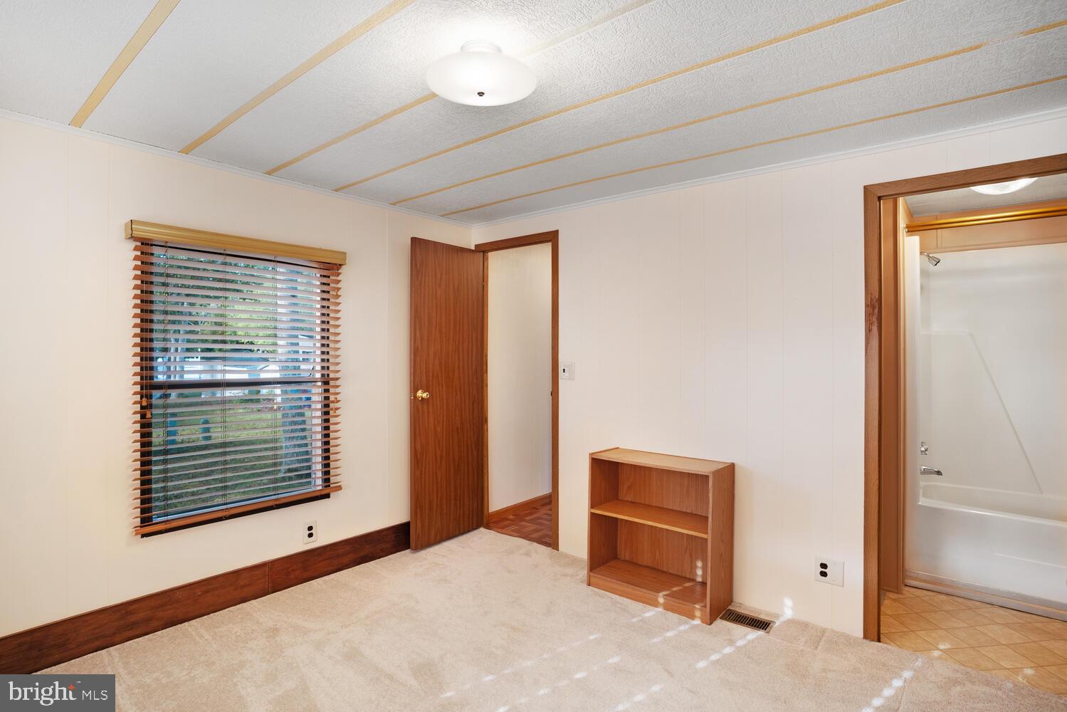 34 Holly Road West Creek, NJ 08092 - Photo 27 of 28 a view of an empty room with a window