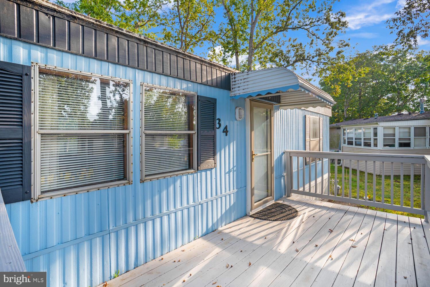 34 Holly Road West Creek, NJ 08092 - Photo 7 of 28 a view of a wooden deck