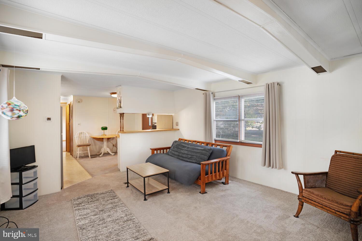34 Holly Road West Creek, NJ 08092 - Photo 9 of 28 a living room with furniture and a window
