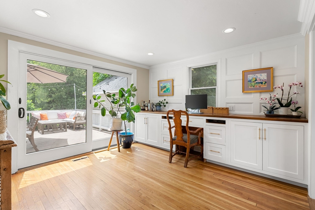 35 Spallus Road Stoughton, MA 02072 - Photo 11 of 39 a view of a workspace with furniture and a potted plant