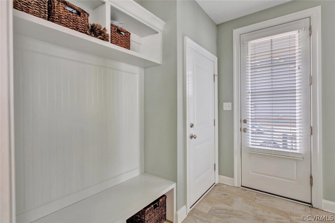 5154 Lake Summer Loop Moseley, VA 23120 - Photo 15 of 41 a view of hallway with window and a kitchen