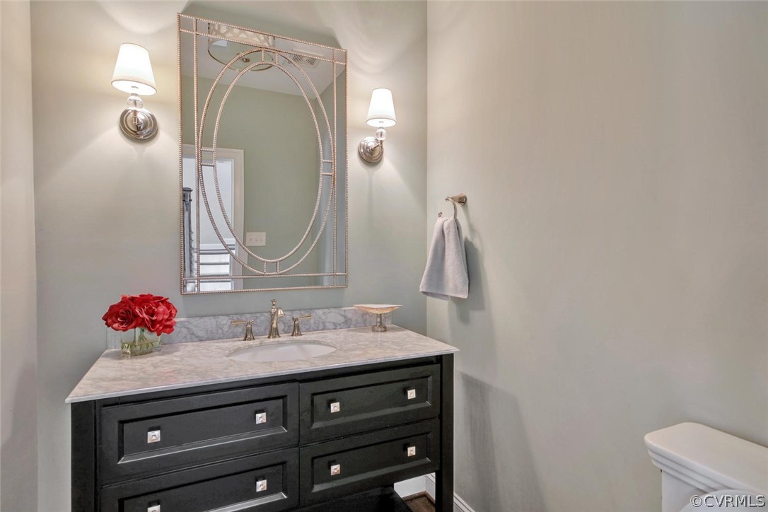 5154 Lake Summer Loop Moseley, VA 23120 - Photo 19 of 41 a bathroom with a sink vanity and a mirror