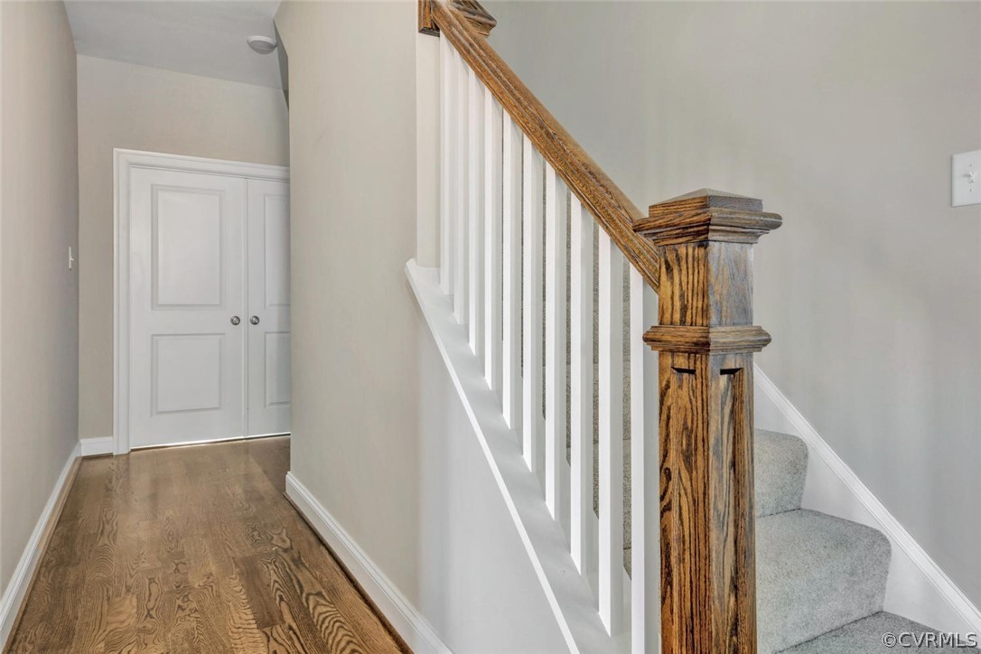 5154 Lake Summer Loop Moseley, VA 23120 - Photo 26 of 41 a view of a hallway with wooden floor and staircase