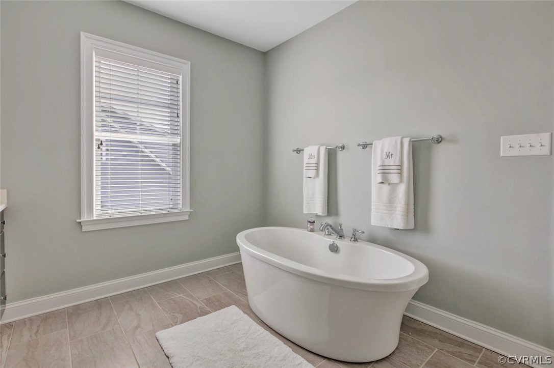 5154 Lake Summer Loop Moseley, VA 23120 - Photo 31 of 41 a white bath tub sitting in a bathroom