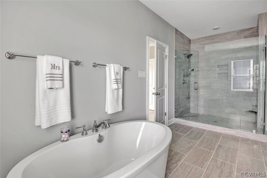 5154 Lake Summer Loop Moseley, VA 23120 - Photo 32 of 41 a bathroom with a bathtub and shower