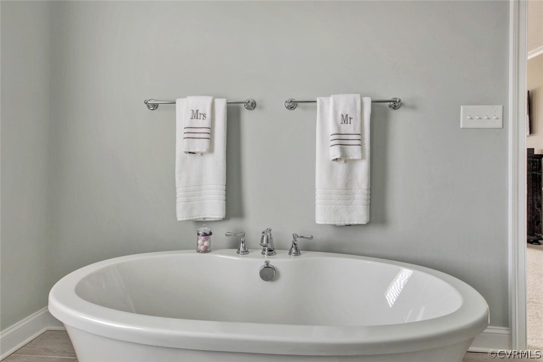 5154 Lake Summer Loop Moseley, VA 23120 - Photo 33 of 41 a bathroom with bathtub and shower