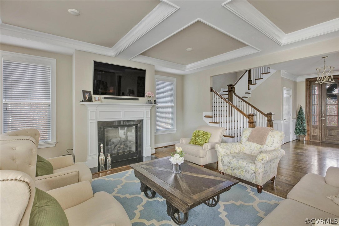 5154 Lake Summer Loop Moseley, VA 23120 - Photo 5 of 41 a living room with furniture a flat screen tv and a fireplace