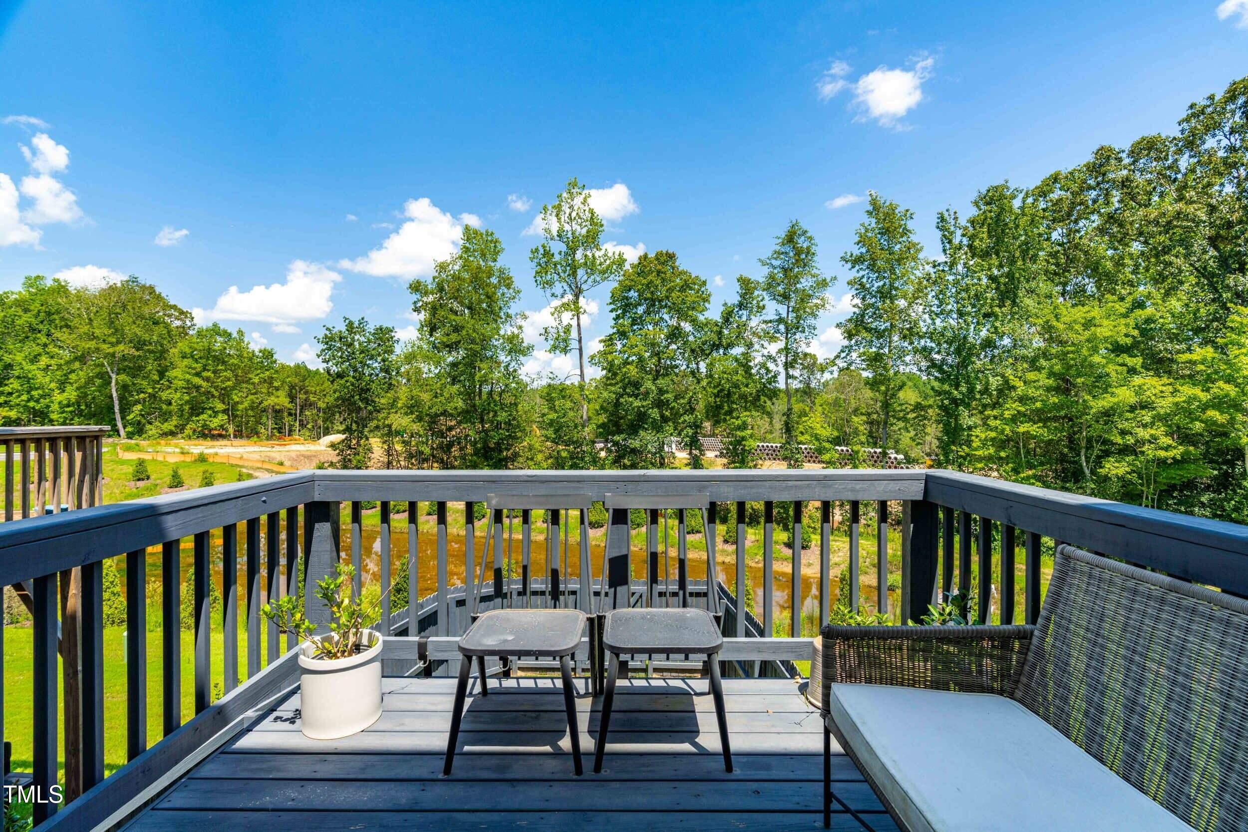 6607 Pathfinder Way Raleigh, NC 27616 - Photo 20 of 37 a view of a two chairs in the deck