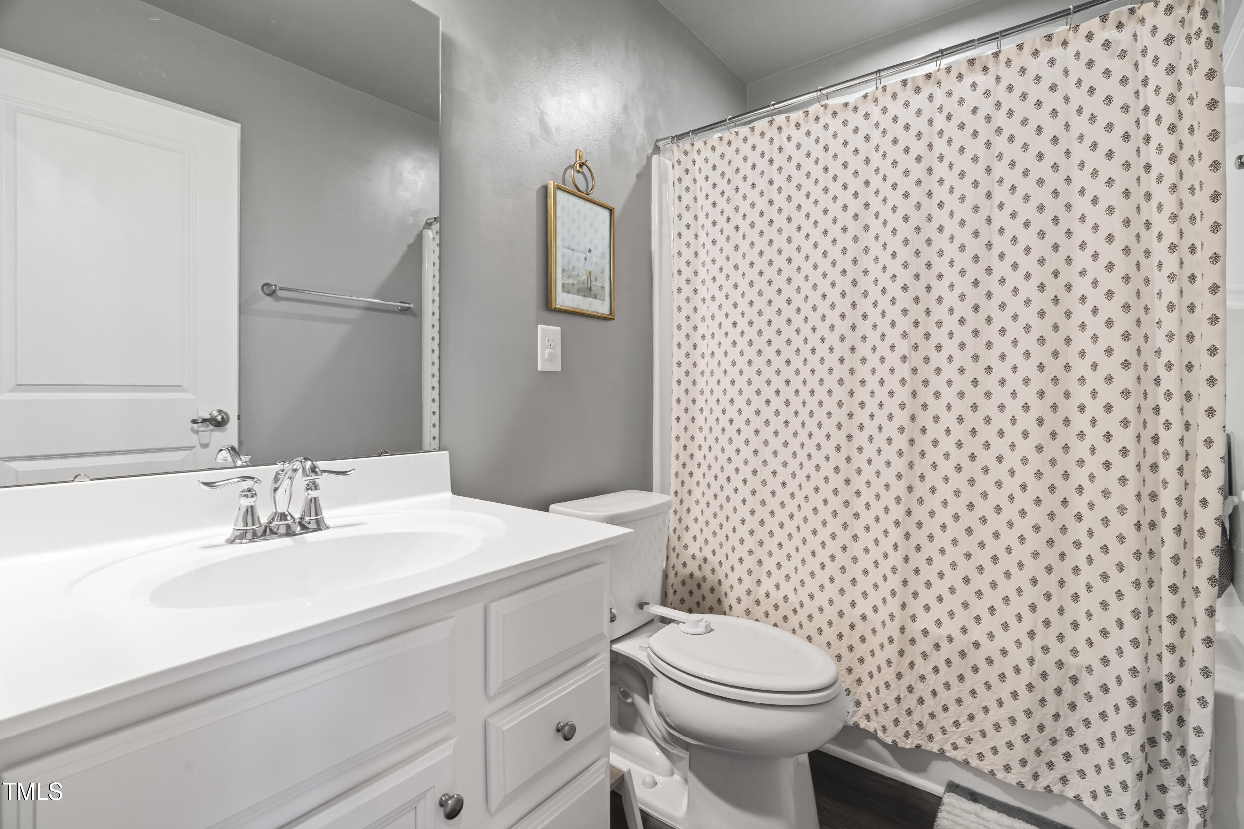 6607 Pathfinder Way Raleigh, NC 27616 - Photo 25 of 37 a bathroom with a sink toilet and shower