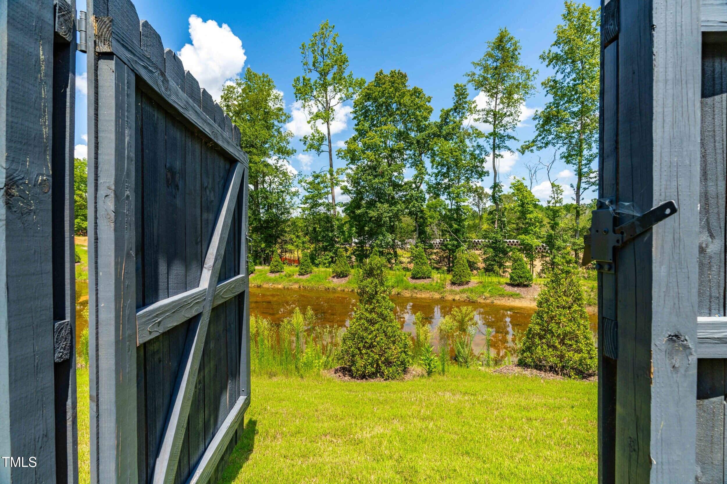 6607 Pathfinder Way Raleigh, NC 27616 - Photo 32 of 37 a view of swimming pool from a window