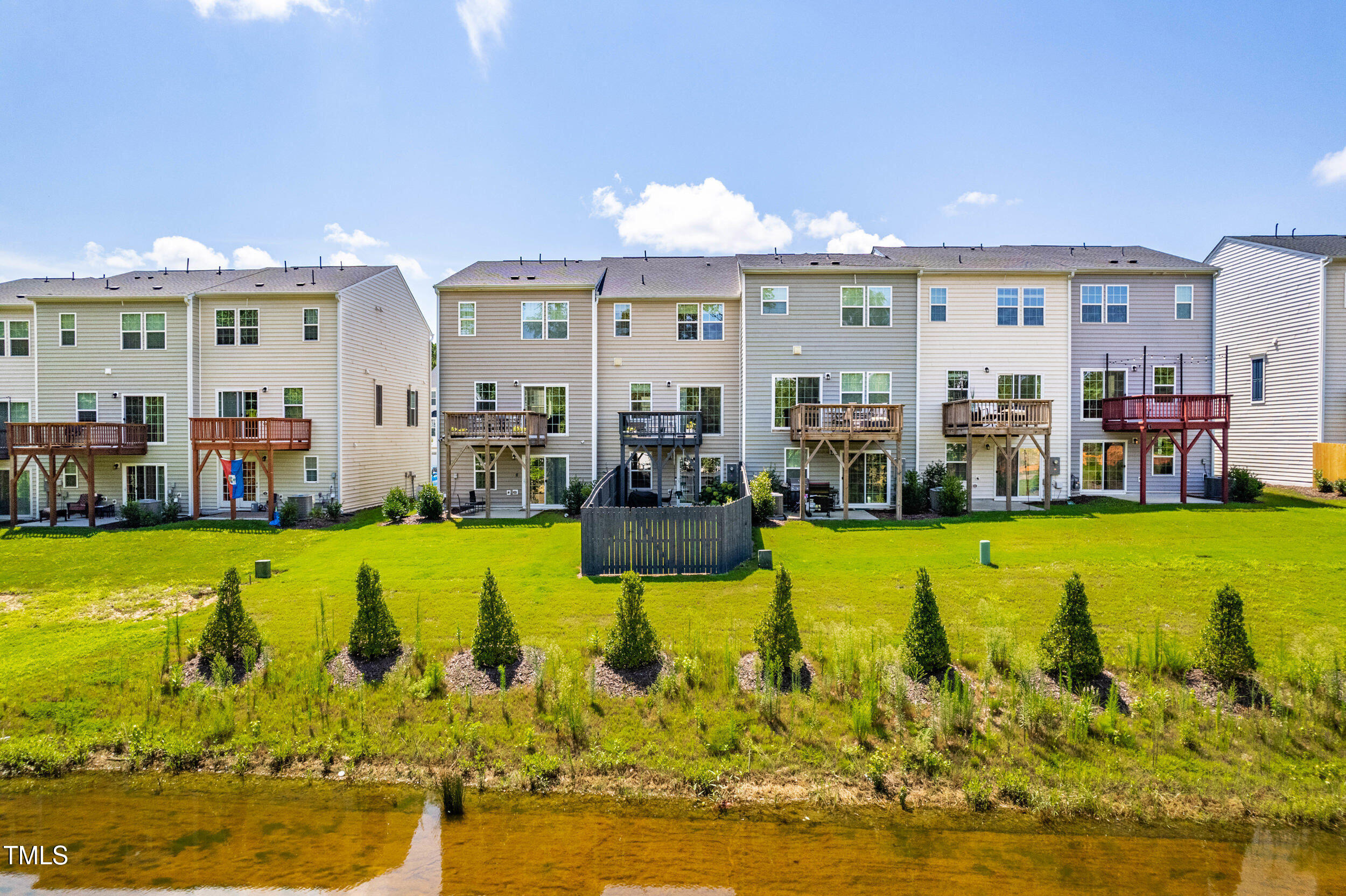 6607 Pathfinder Way Raleigh, NC 27616 - Photo 33 of 37 a view of a swimming pool with outdoor seating