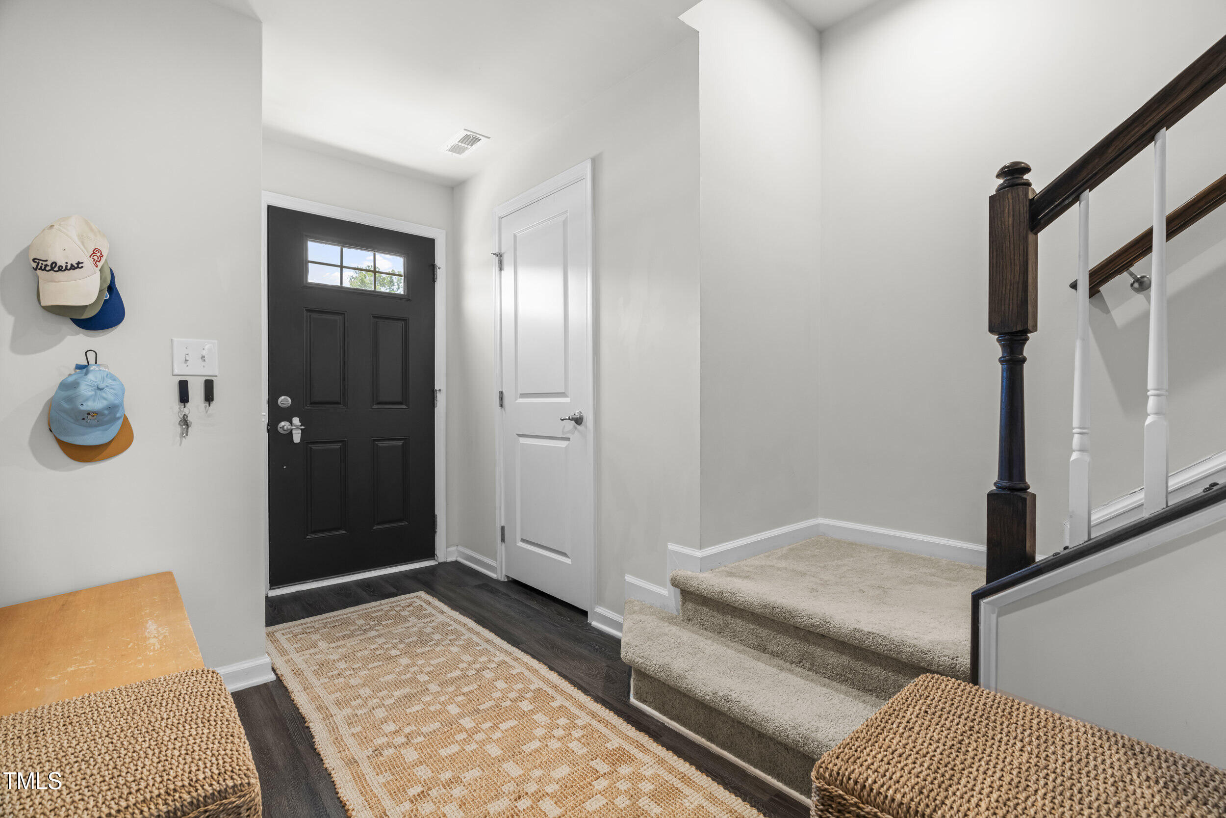 6607 Pathfinder Way Raleigh, NC 27616 - Photo 5 of 37 a bedroom with a bed and a rug