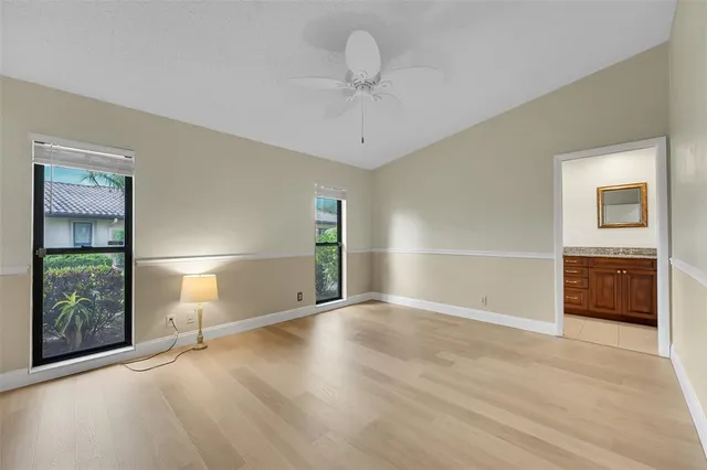 a view of an empty room with a bathroom