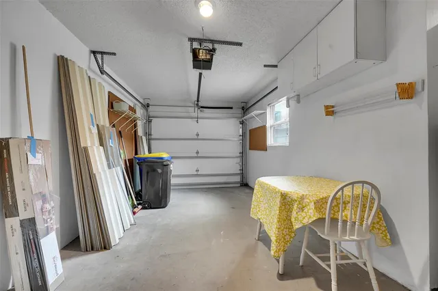 a view of a hallway with a chandelier