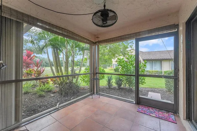 a garden with trees in front of it