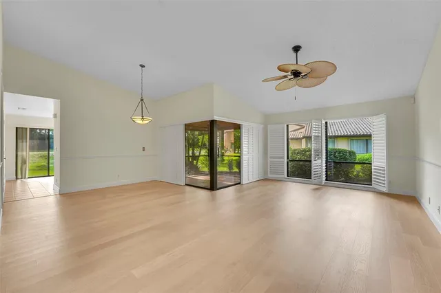 a view of room with window and hardwood