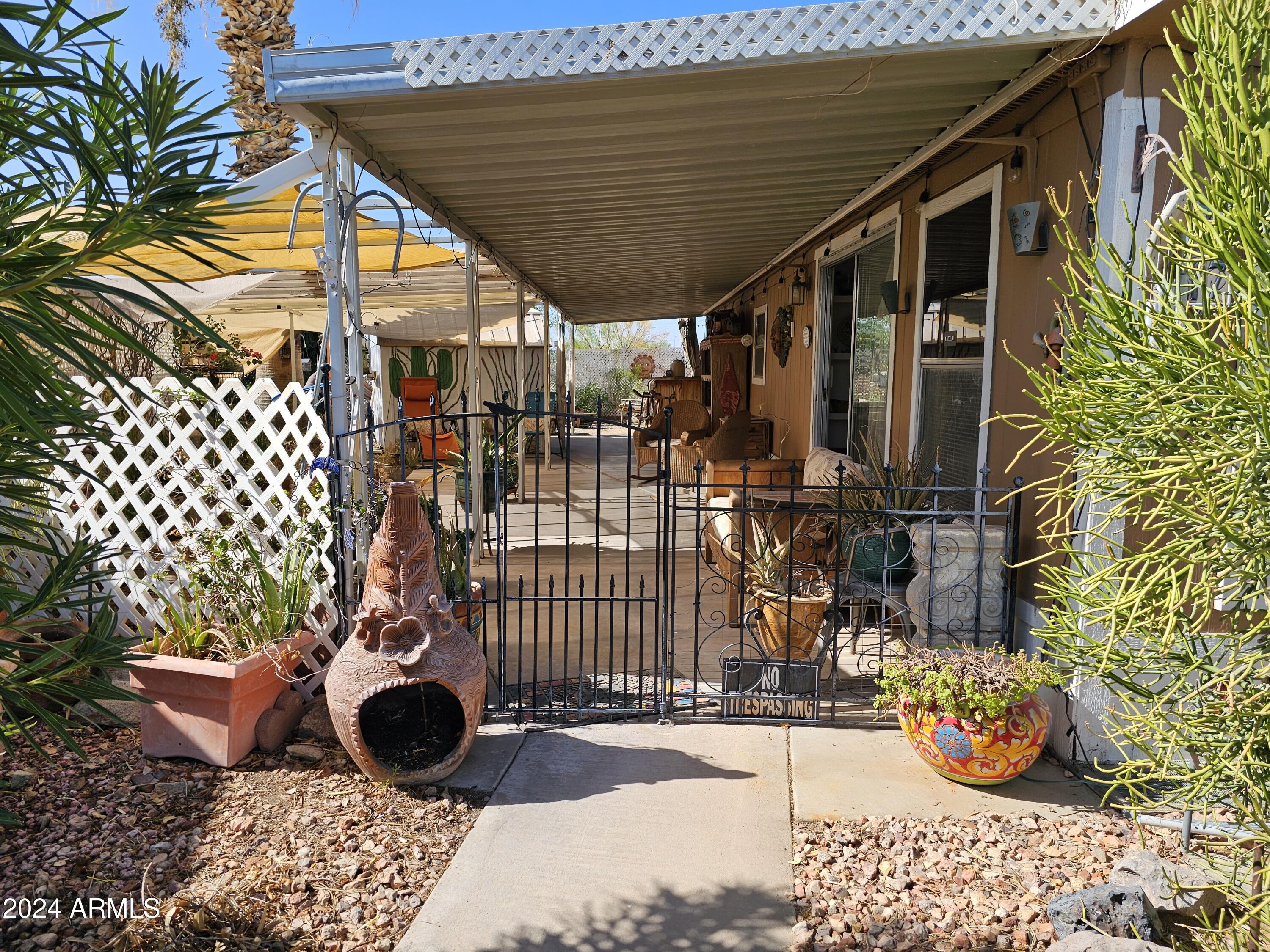 3405 South Tomahawk Road, Unit 17 Apache Junction, AZ 85119 - Photo 3 of 19 Covered patio