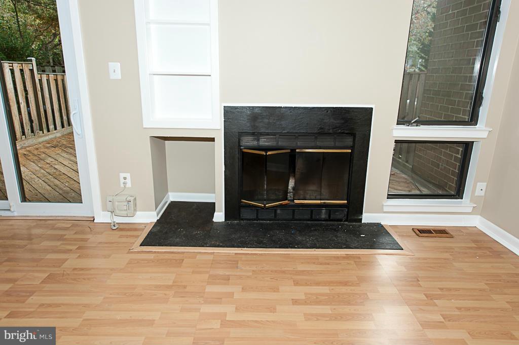 11011 Thrush Ridge Road Reston, VA 20191 - Photo 11 of 30 a living room with a fireplace