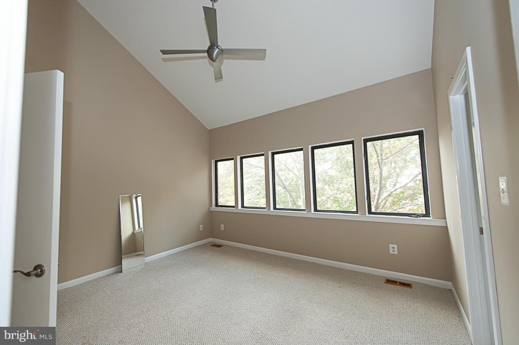 11011 Thrush Ridge Road Reston, VA 20191 - Photo 12 of 30 a view of an empty room with a window