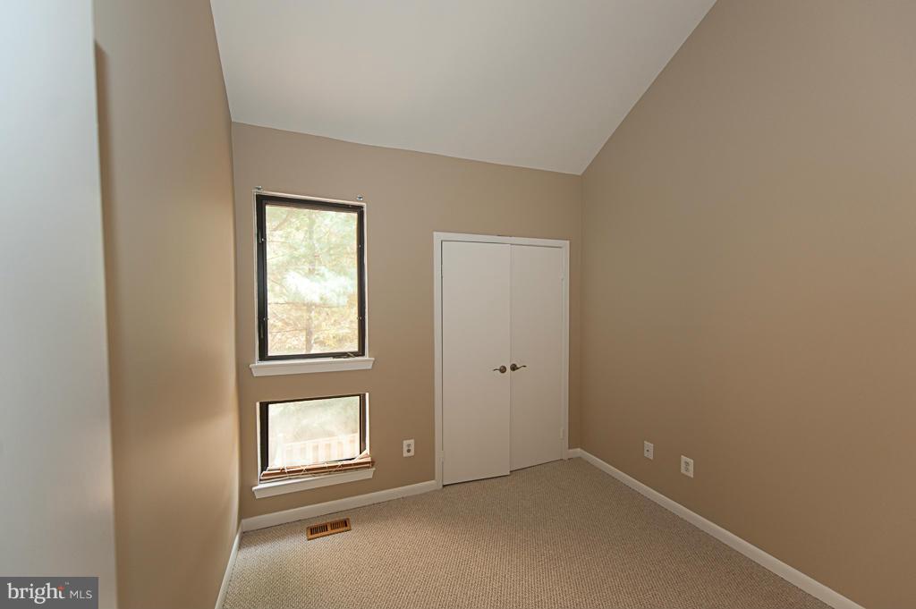 11011 Thrush Ridge Road Reston, VA 20191 - Photo 19 of 30 an empty room with windows