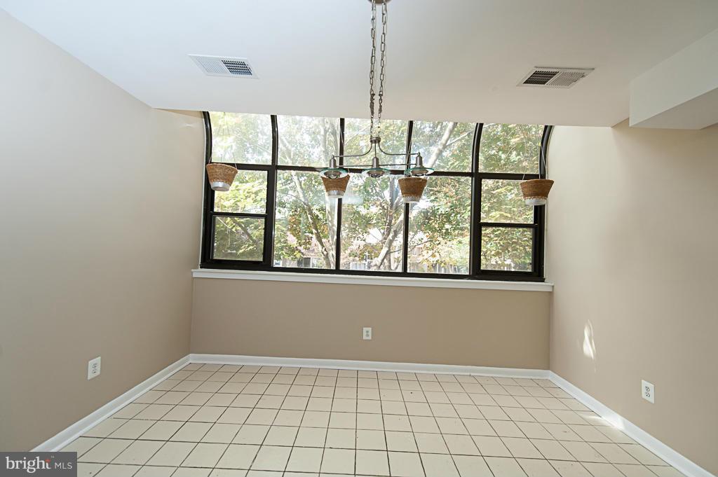 11011 Thrush Ridge Road Reston, VA 20191 - Photo 3 of 30 a view of an empty room with a window