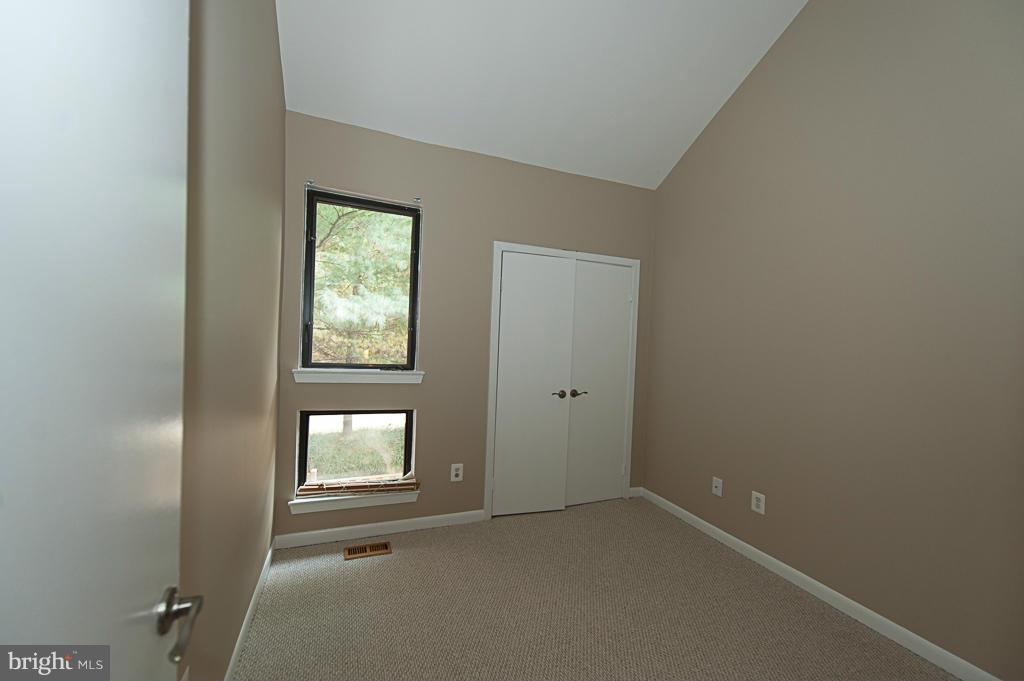 11011 Thrush Ridge Road Reston, VA 20191 - Photo 24 of 30 a view of an empty room with a window