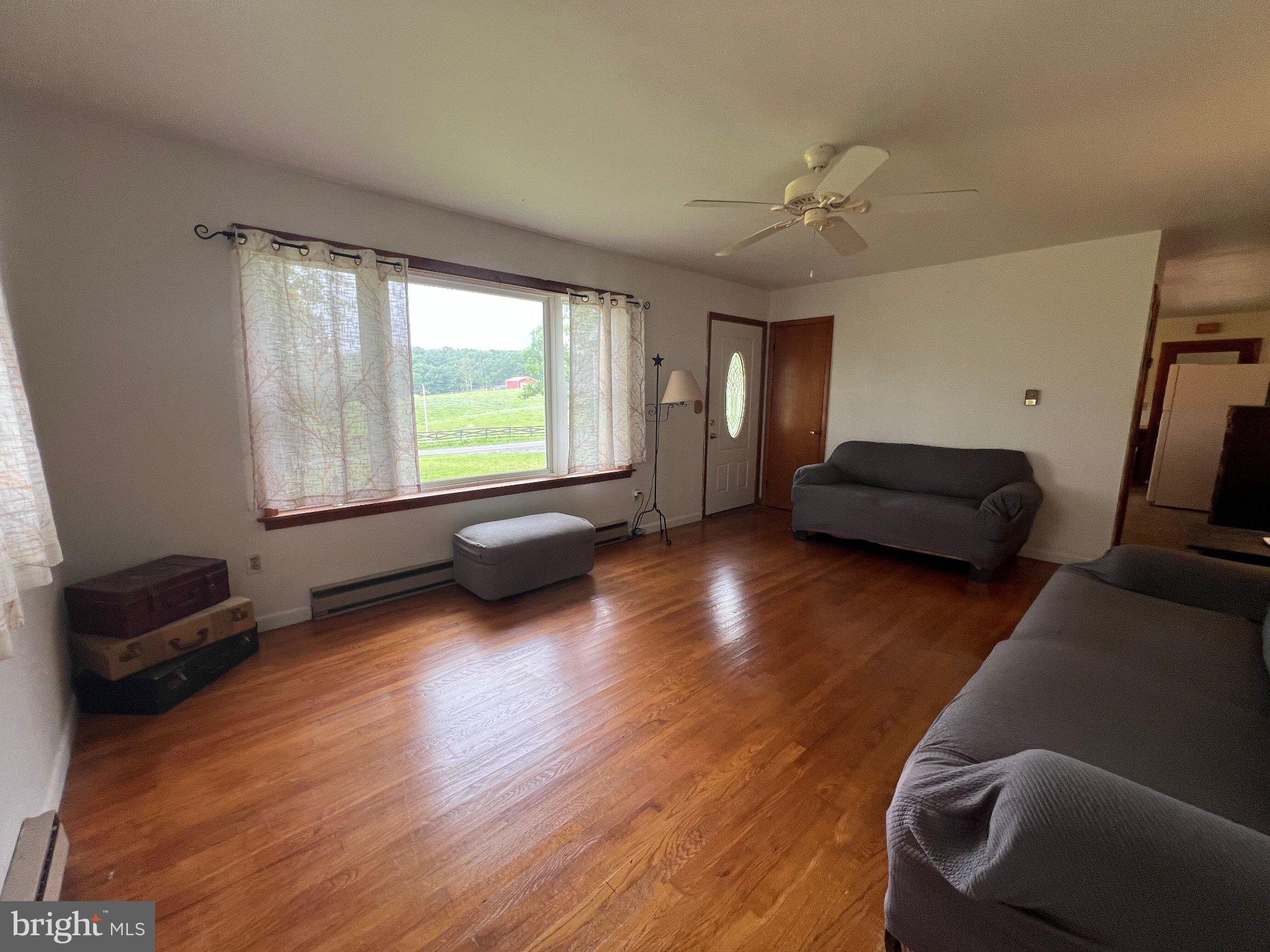 381 Co Rte 7/1 Augusta, WV 26704 - Photo 24 of 42 Bright and airy living space awaits.