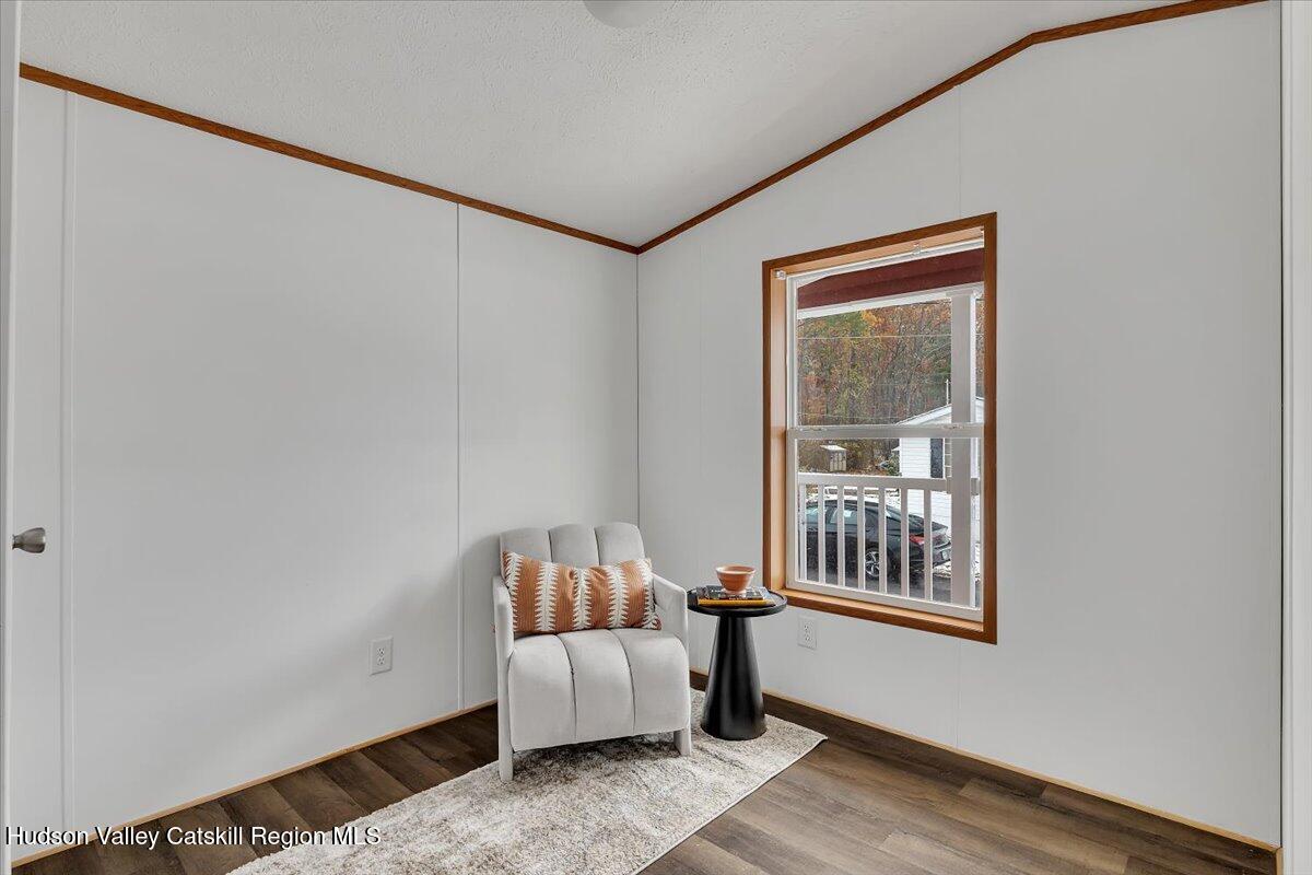 331 Rowland Street, Unit 51 Ballston Spa, NY 12020 - Photo 17 of 18 a living room with furniture and windows