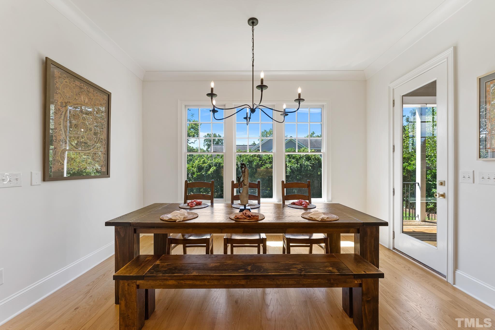 3401 Lewis Farm Road Raleigh, NC 27607 - Photo 27 of 75 a view of a dining room with furniture window and outside view