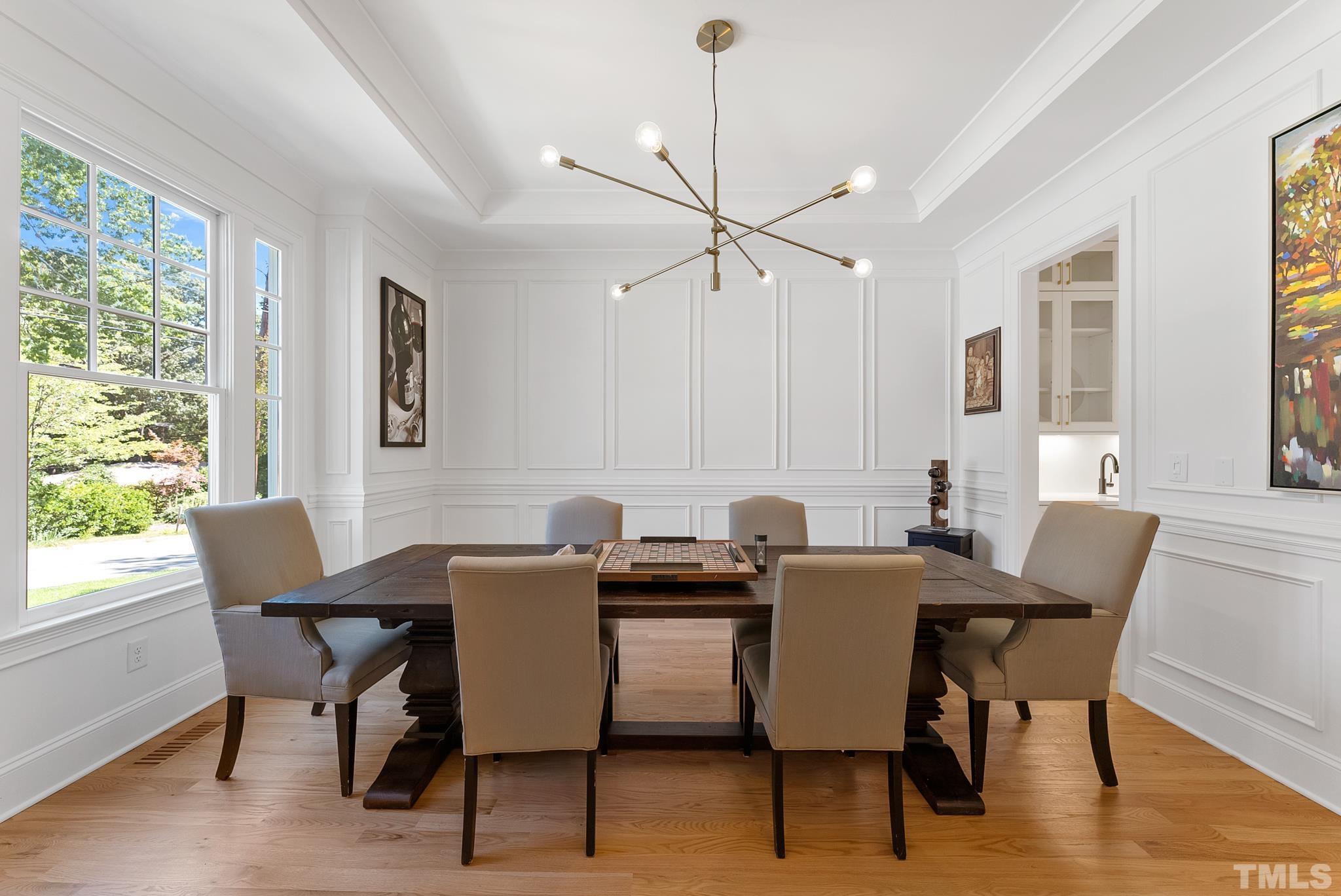 3401 Lewis Farm Road Raleigh, NC 27607 - Photo 6 of 75 a view of a dining room with furniture window and outside view