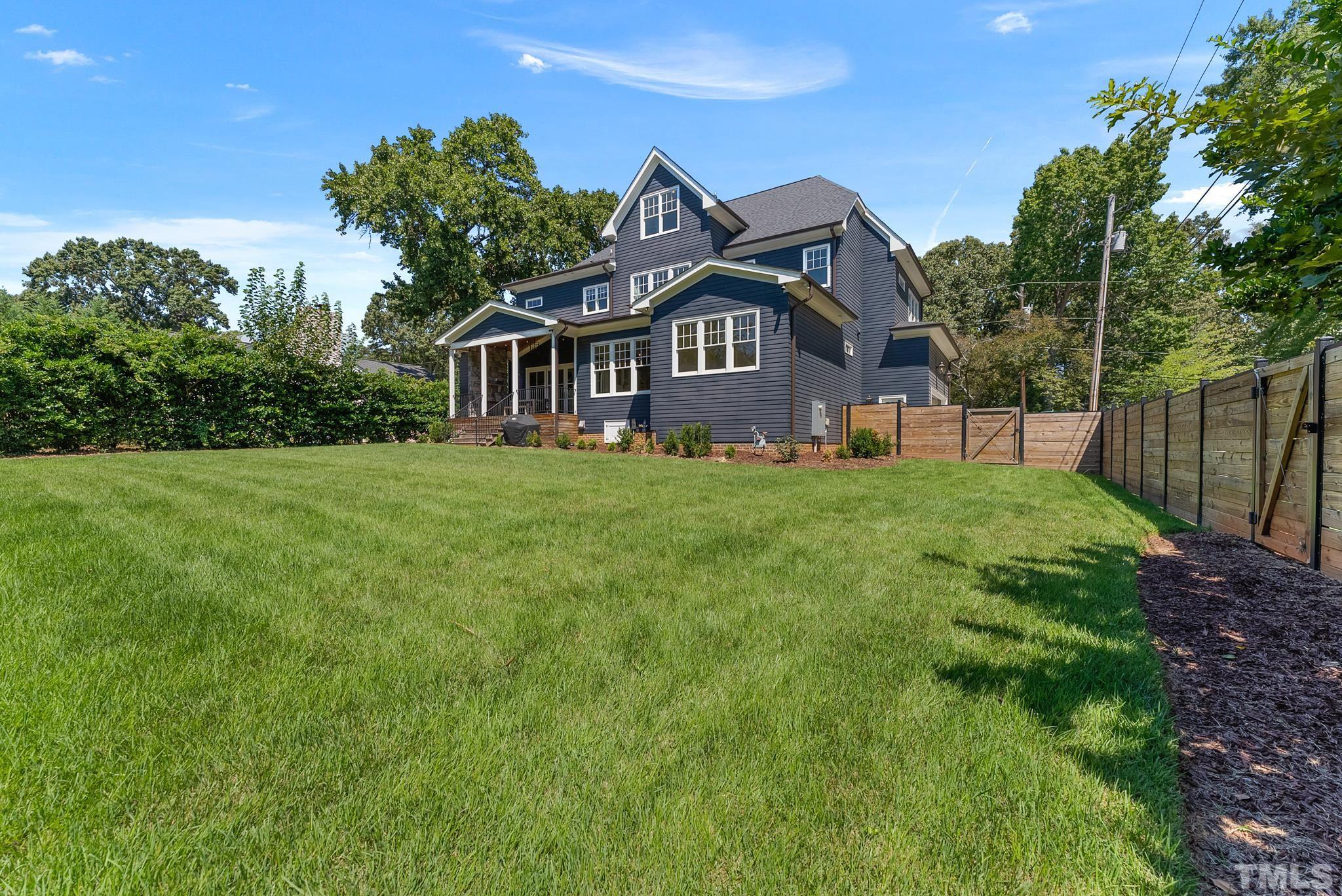 3401 Lewis Farm Road Raleigh, NC 27607 - Photo 67 of 75 a front view of a house with a yard