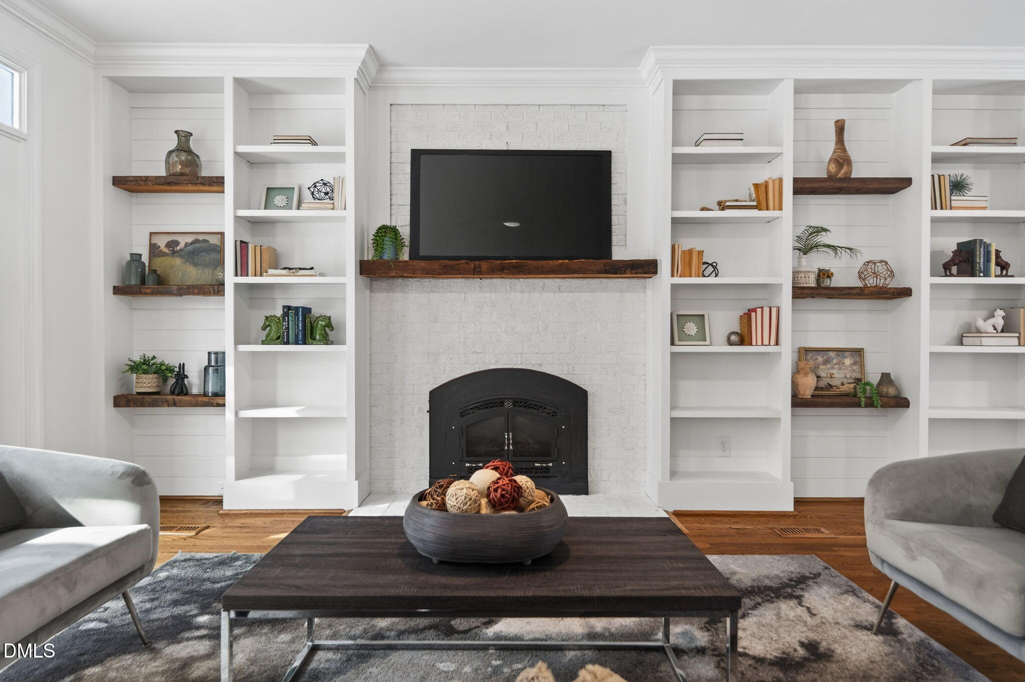 11505 Burberry Drive Raleigh, NC 27614 - Photo 13 of 80 a living room with furniture and a fireplace