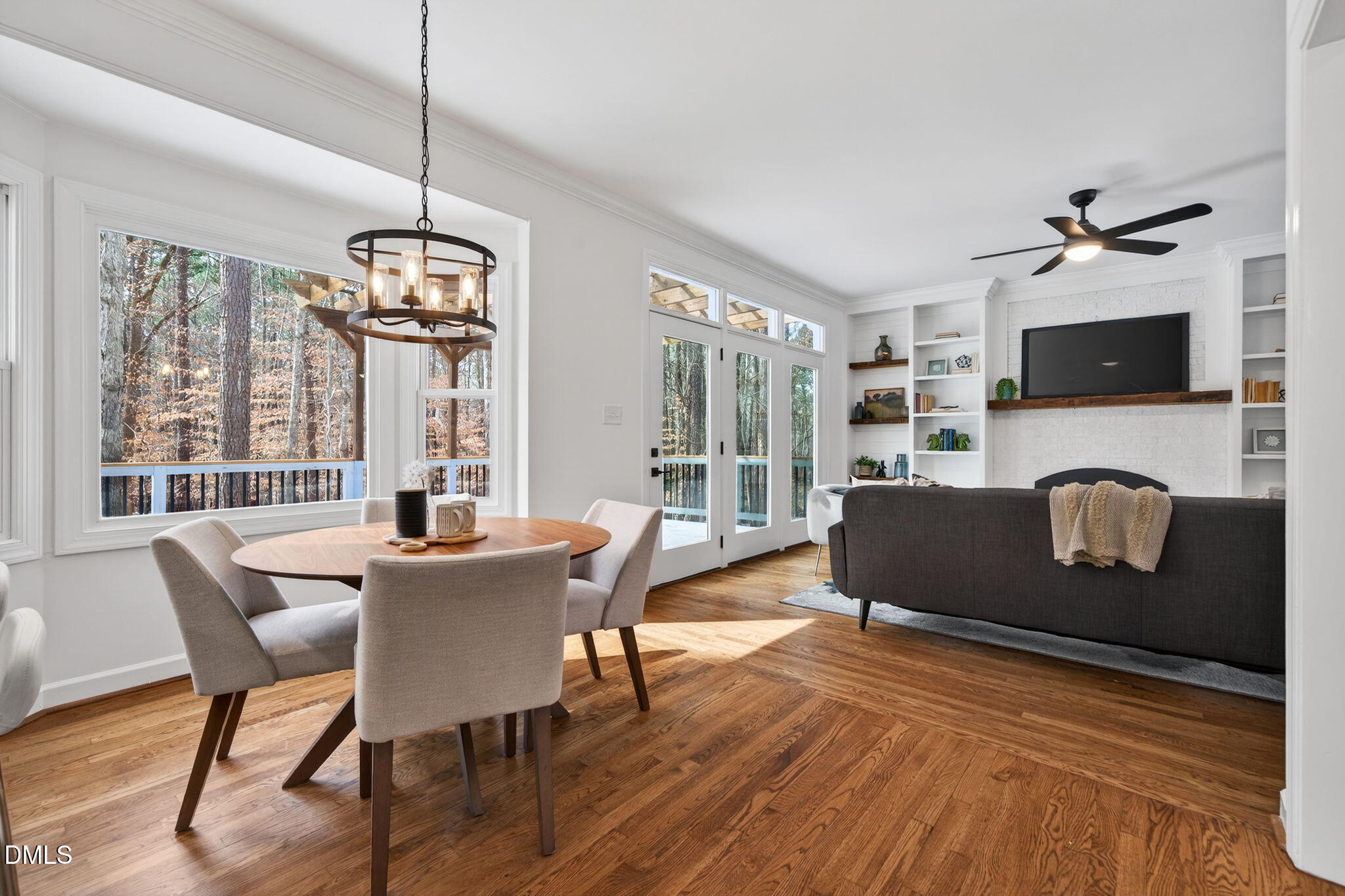 11505 Burberry Drive Raleigh, NC 27614 - Photo 18 of 80 a living room with furniture a flat screen tv and a window