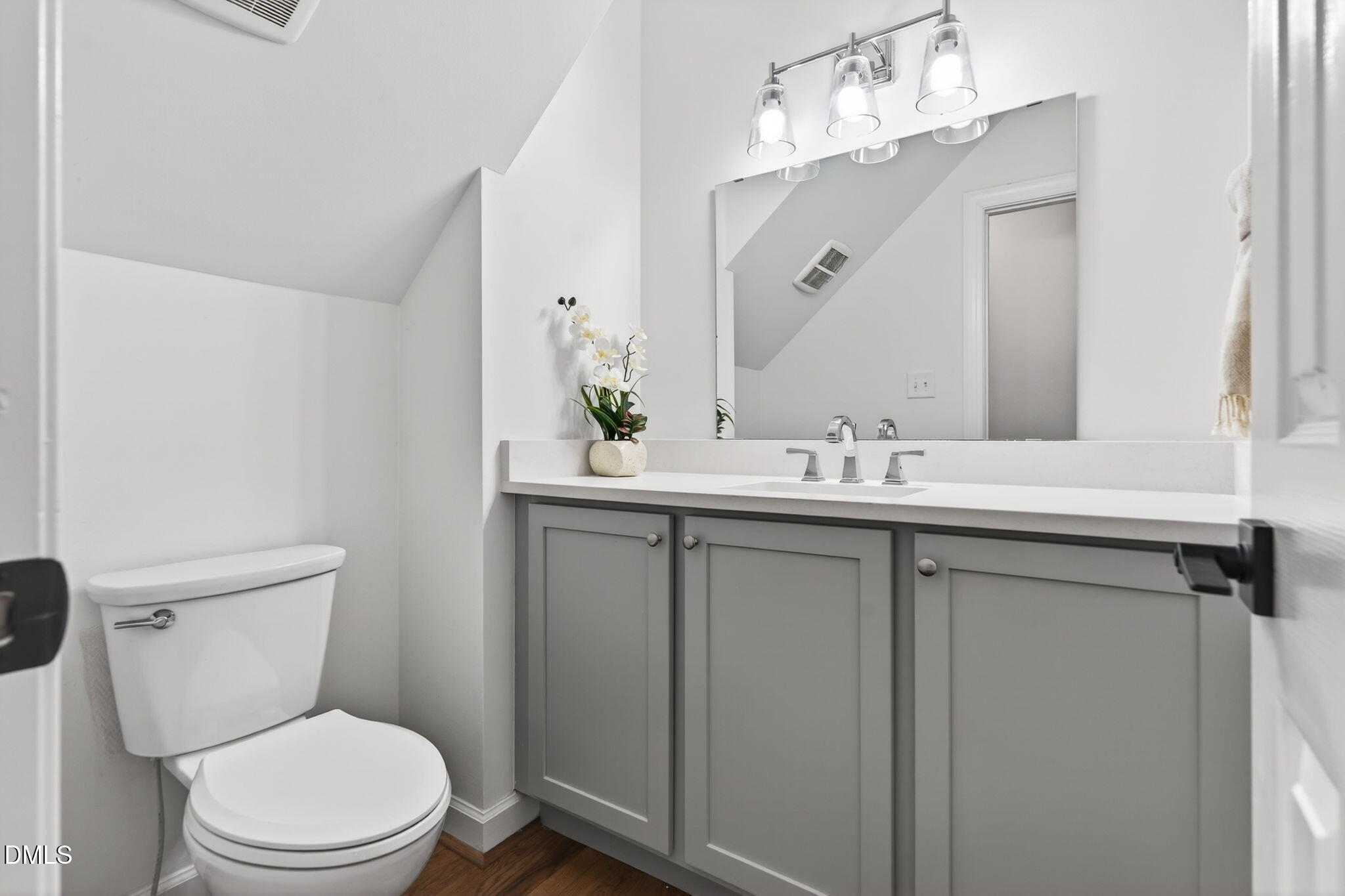 11505 Burberry Drive Raleigh, NC 27614 - Photo 24 of 80 a bathroom with a sink vanity mirror and toilet