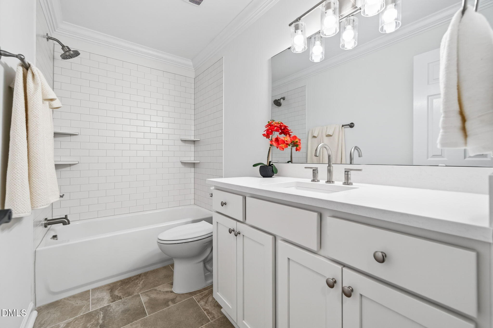 11505 Burberry Drive Raleigh, NC 27614 - Photo 40 of 80 a bathroom with a sink vanity mirror and toilet
