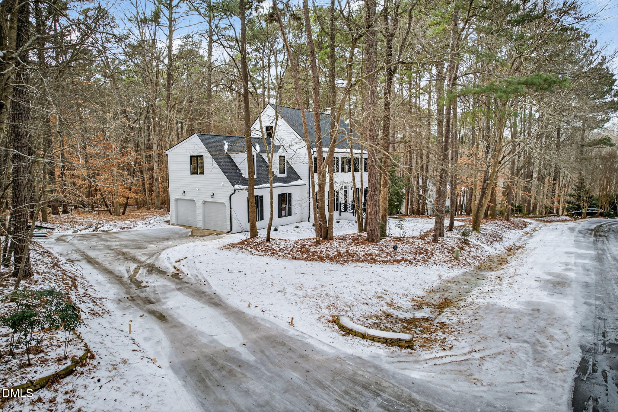 11505 Burberry Drive Raleigh, NC 27614 - Photo 55 of 80 a view of a dirt road with large trees