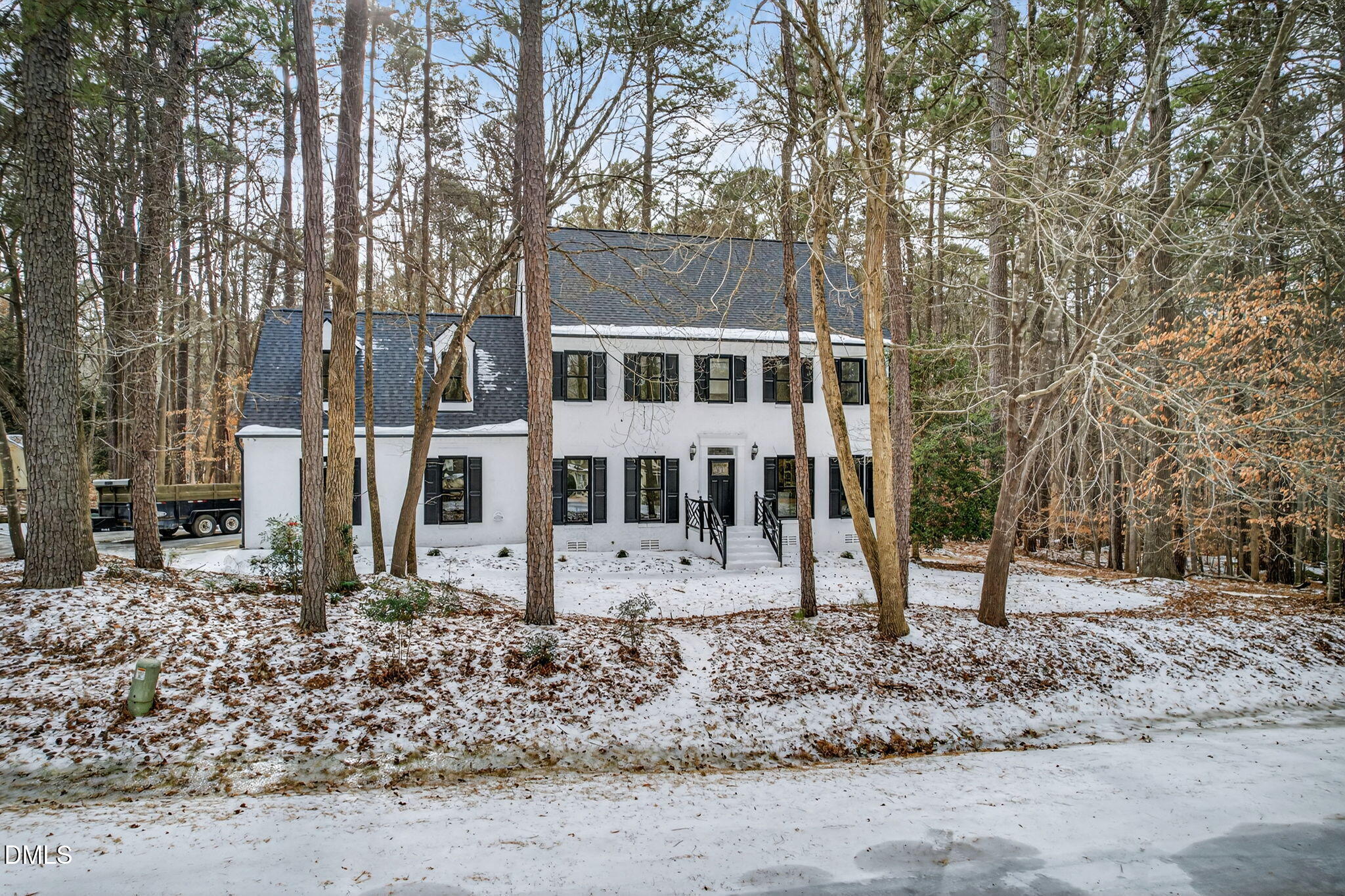 11505 Burberry Drive Raleigh, NC 27614 - Photo 56 of 80 a view of a house with a yard covered in snow