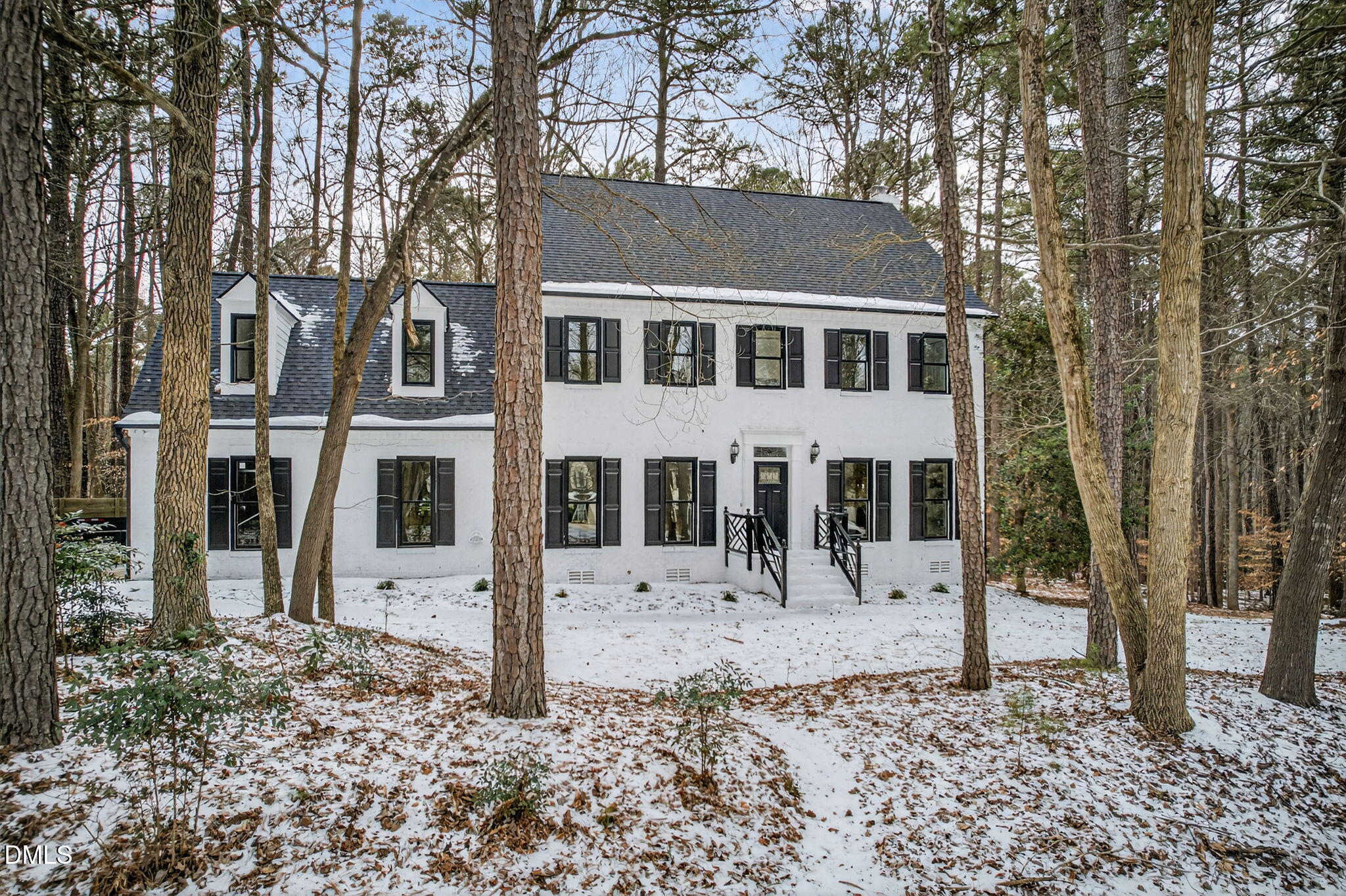11505 Burberry Drive Raleigh, NC 27614 - Photo 62 of 80 a front view of a house with a yard covered with snow