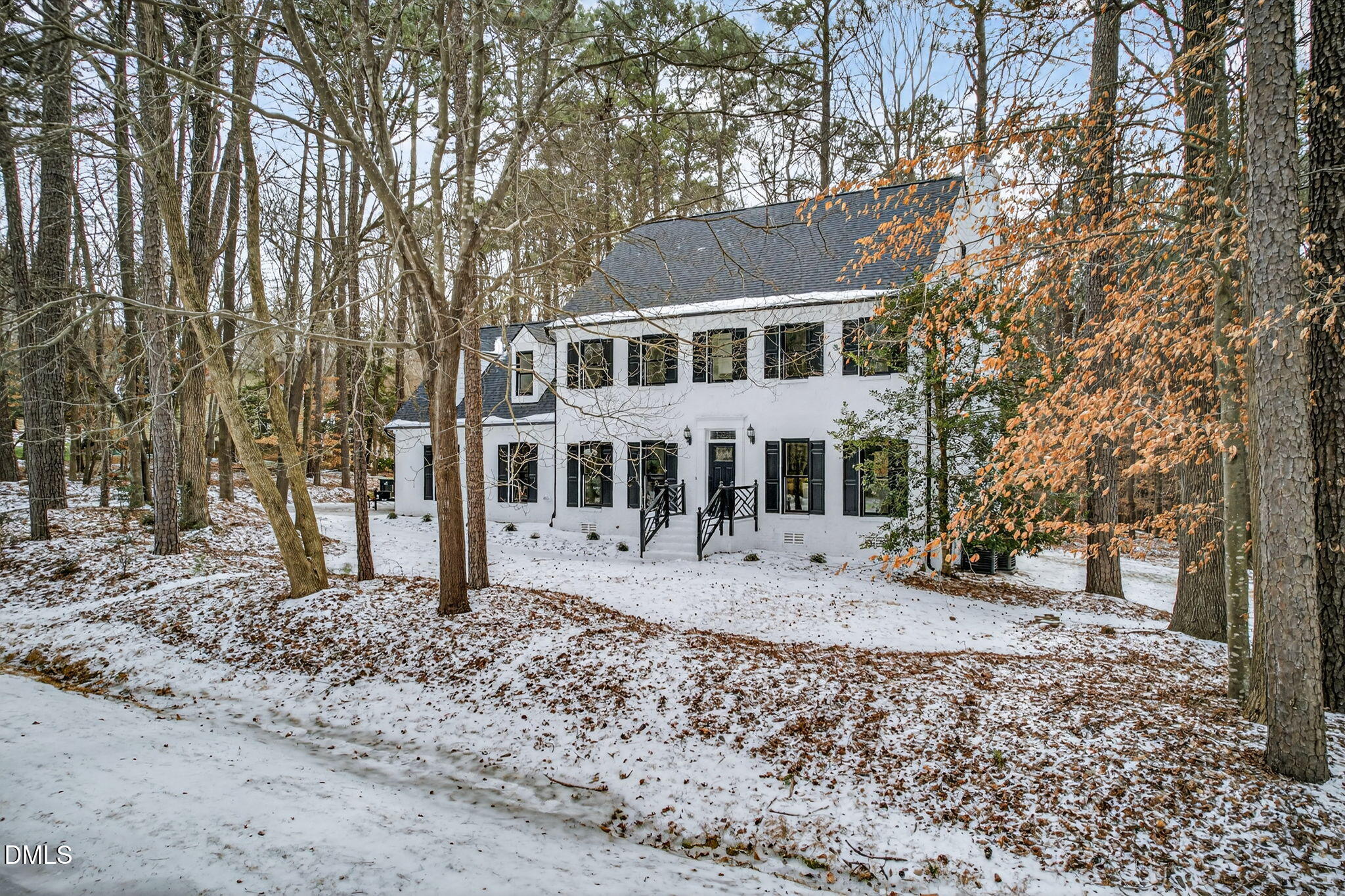 11505 Burberry Drive Raleigh, NC 27614 - Photo 63 of 80 a front view of a house with a yard covered with snow and trees