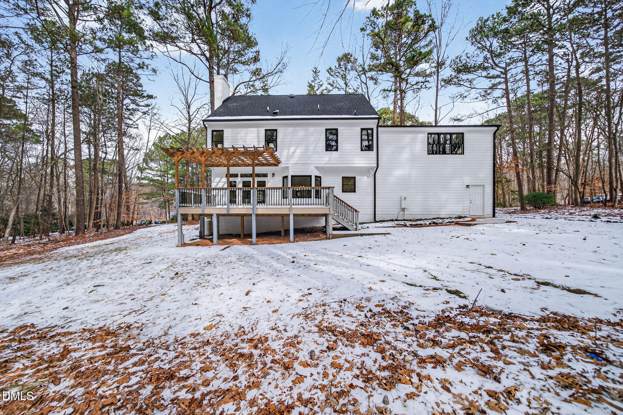 11505 Burberry Drive Raleigh, NC 27614 - Photo 66 of 80 a view of a white house that has a small yard and large trees