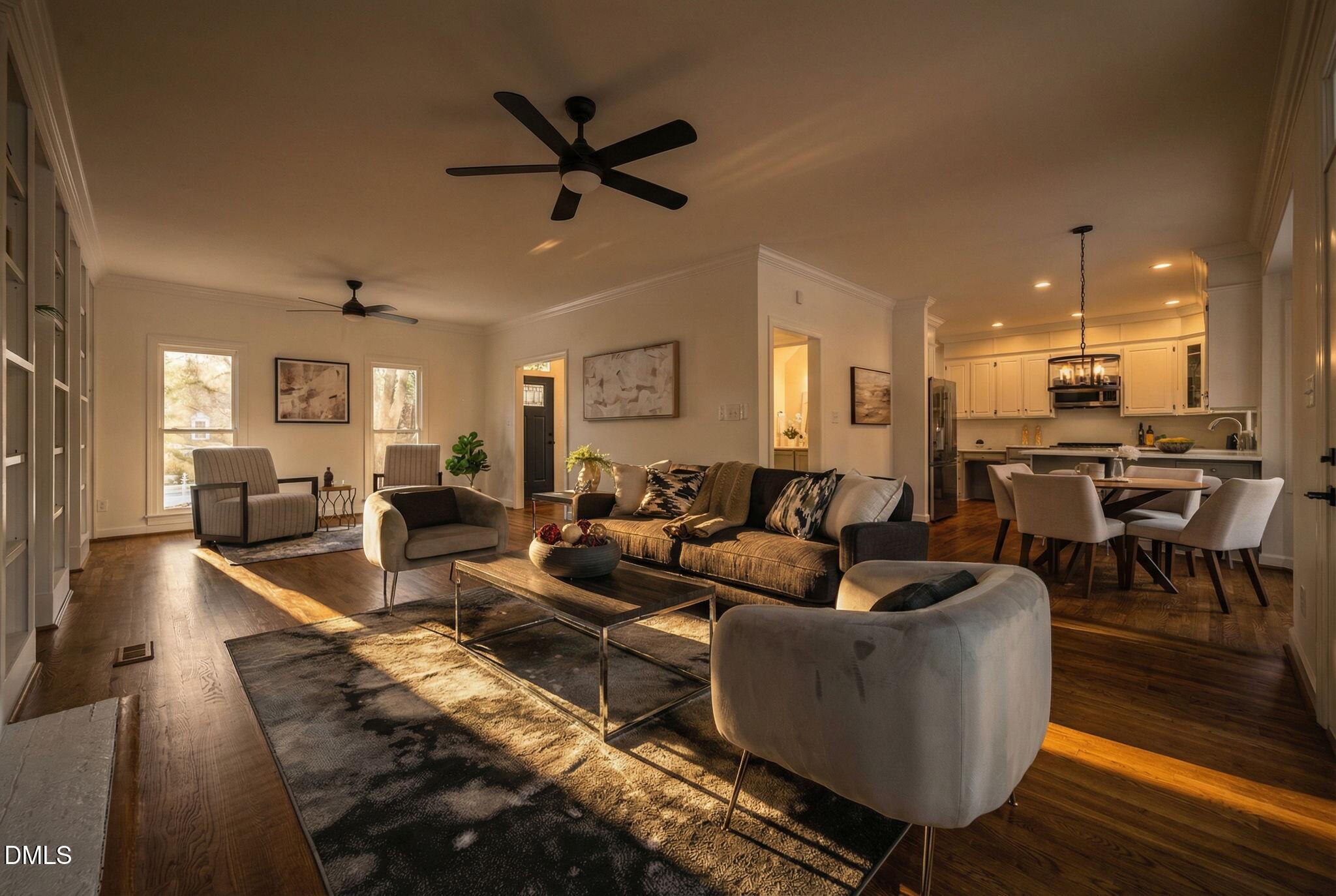 11505 Burberry Drive Raleigh, NC 27614 - Photo 79 of 80 a living room with furniture kitchen view and a wooden floor