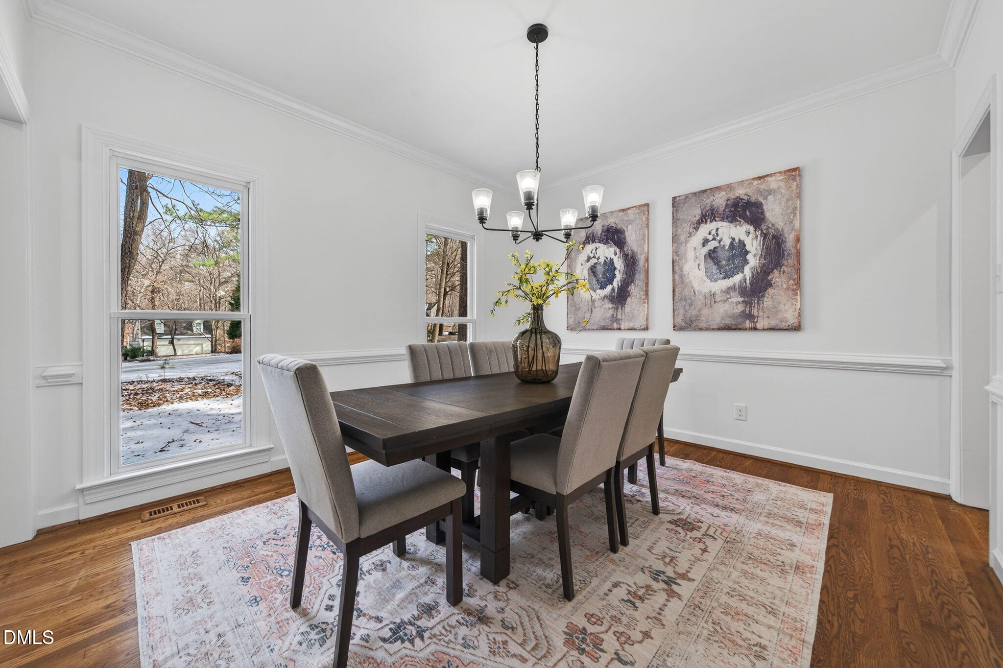 11505 Burberry Drive Raleigh, NC 27614 - Photo 7 of 80 a dining room with furniture a rug and wooden floor