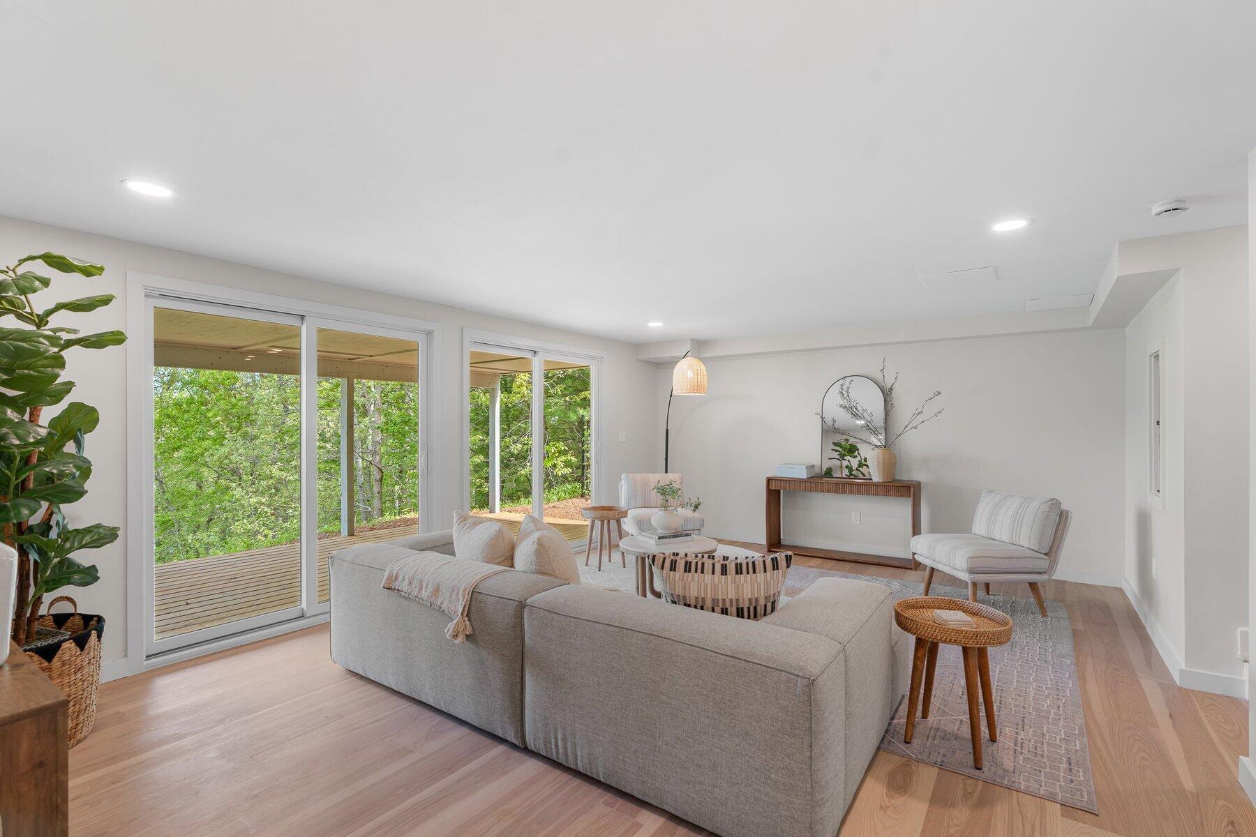 162 Main Street Osterville, MA 02655 - Photo 29 of 50 a living room with furniture and a large window