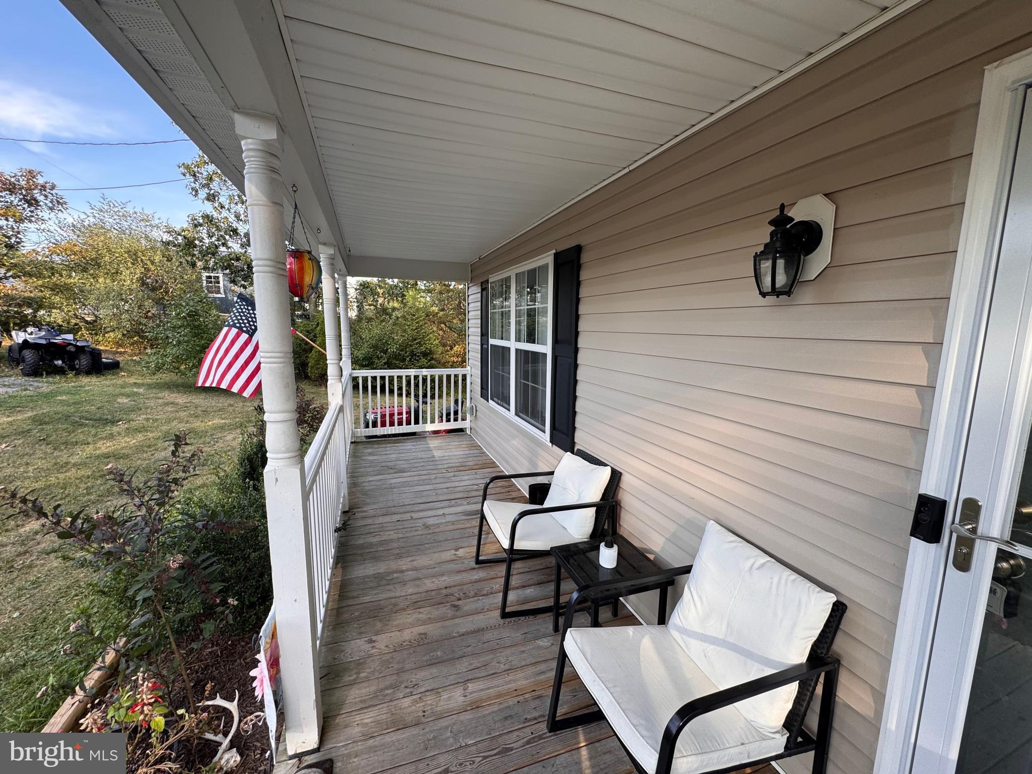 277 McDonald Road Winchester, VA 22602 - Photo 2 of 35 a view of a porch with furniture