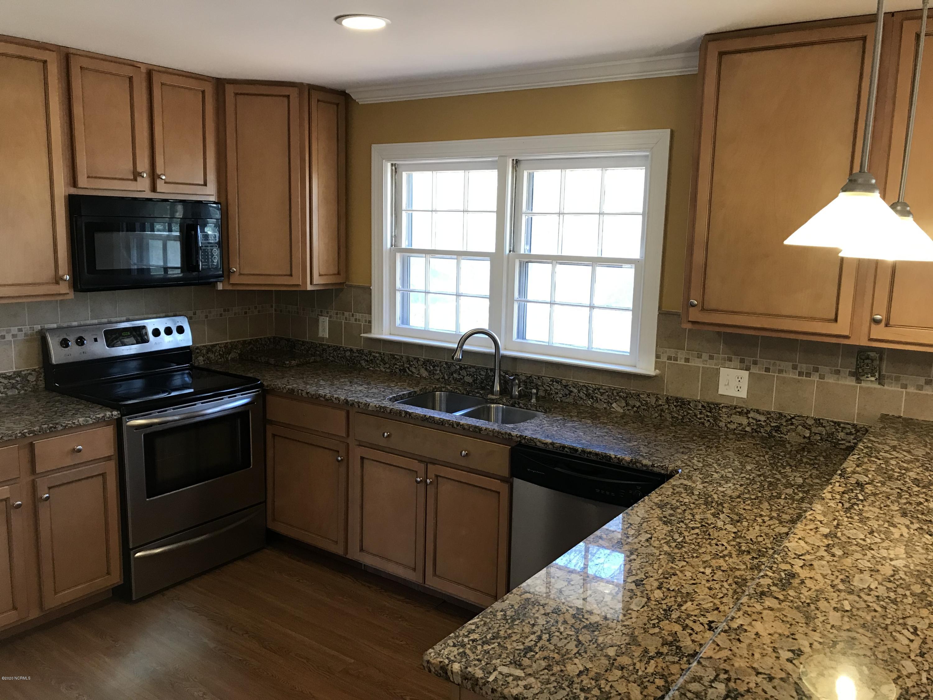1208 Robin Hill Road Northwest Wilson, NC 27896 - Photo 9 of 31 Kitchen- Updated with Granite Counter tops and Stainless Appliances