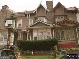 811 Marlyn Road Philadelphia, PA 19151 - Photo 1 of 1 a front view of a house with a yard