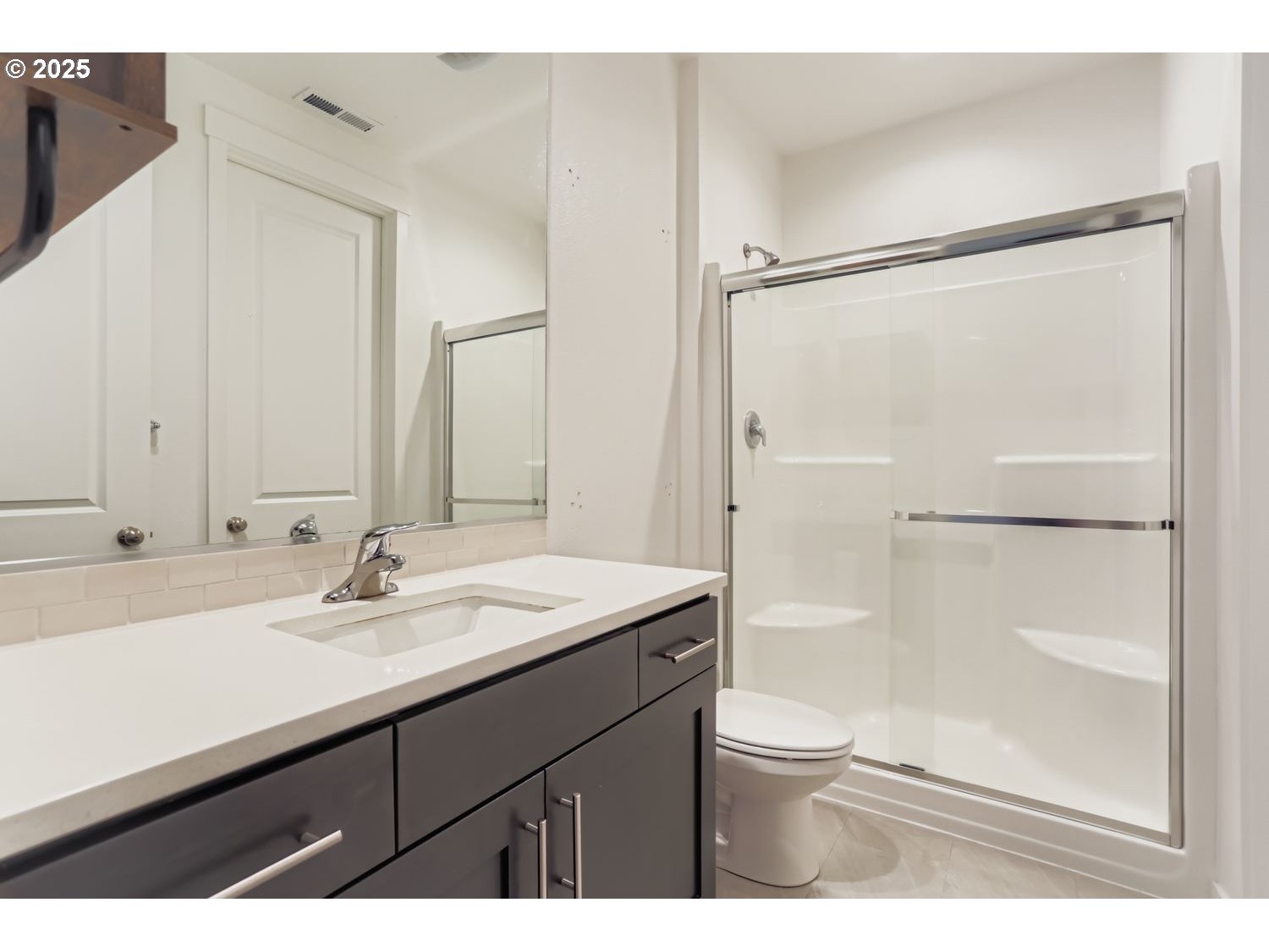 234 West 18th Street Lafayette, OR 97127 - Photo 17 of 27 a bathroom with a sink a toilet and shower