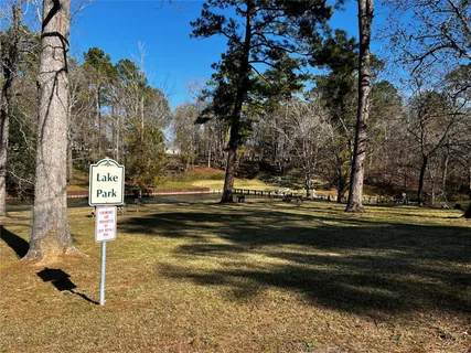 a view of residential house with green space