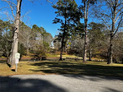a view of park on side of street